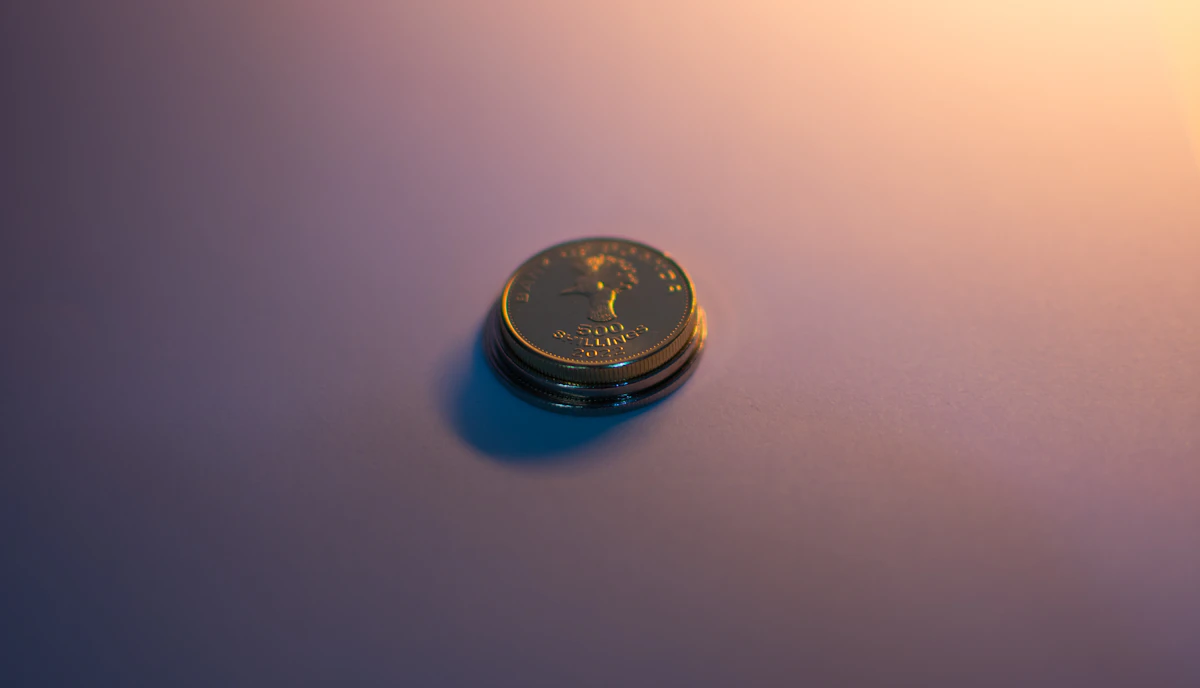 Stacked coins reflecting light